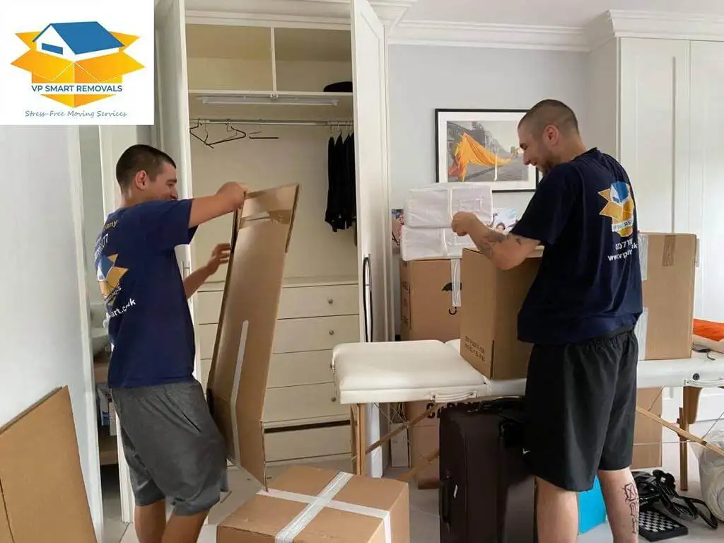 London movers moving packed furniture and belongings into storage
